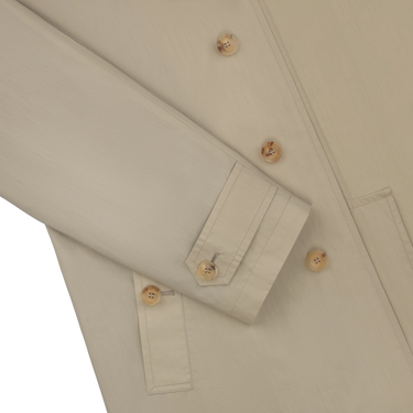 Detailed view of sleeve and cuff button on Sealup 11516SEU 96233 119 beige raincoat, part of SARTALE's Spring/Summer 25 outerwear.