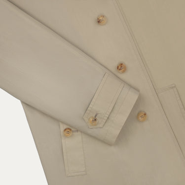 Detailed view of sleeve and cuff button on Sealup 11516SEU 96233 119 beige raincoat, part of SARTALE's Spring/Summer 25 outerwear.