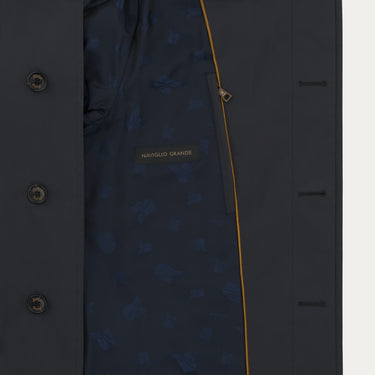 Interior view of Sealup raincoat showing navy lining with Namglo Grande label and yellow trim, combining elegance and utility.