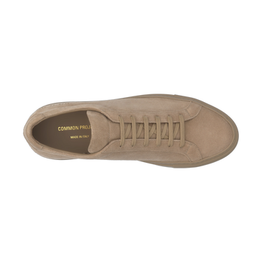 Top view of Common Projects 'Achilles Tonal' suede sneakers in walnut, showcasing premium Italian craftsmanship and tonal laces.