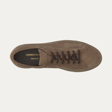 Top view of Common Projects Achilles Tonal sneaker 2478 9417 in dark brown suede, showcasing premium craftsmanship and minimalist design.