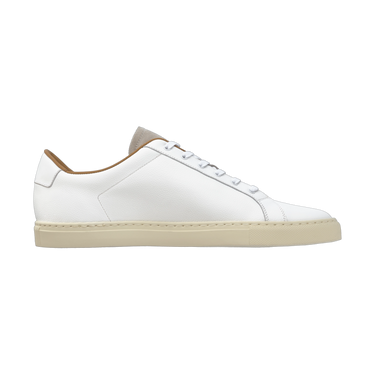 Side profile of Common Projects Retro Low 2480 0506 sneaker in white leather with beige rubber sole, part of SS25 collection.