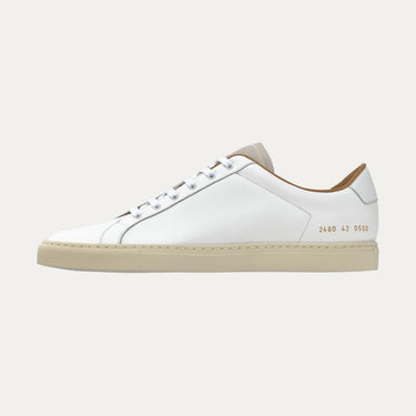 Common Projects Retro Low sneaker in white leather with signature gold serial number 2480 0506 on heel, SS25 release at SARTALE.