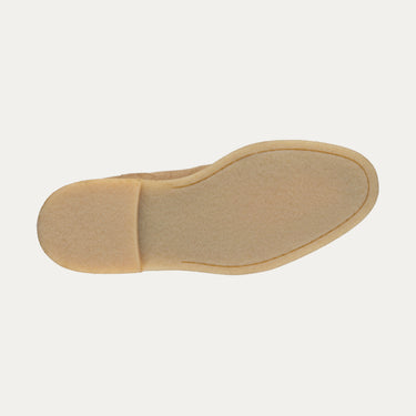 Outsole view of Common Projects Chelsea Boot 2495 1302 in Light Brown featuring a crepe rubber sole for comfort and grip. SS25 men's footwear.