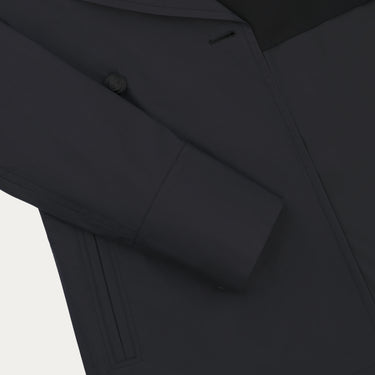 Detail of sleeve and button area on Sealup Amalfi Peacoat in Dark Blue. Sophisticated design from SARTALE’s Spring/Summer 25 apparel line.
