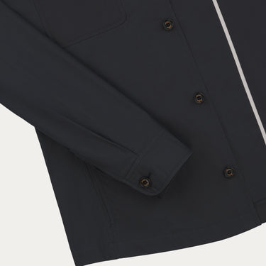 Detail of Sealup B770BAG 96233 92 overshirt sleeve and cuff in navy cotton, emphasizing refined stitching and SS25 outerwear quality.
