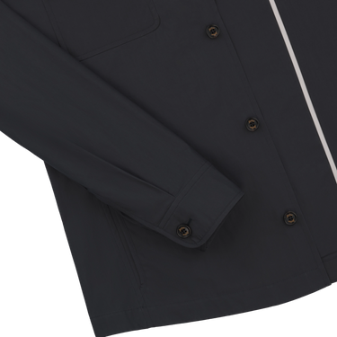 Detail of Sealup B770BAG 96233 92 overshirt sleeve and cuff in navy cotton, emphasizing refined stitching and SS25 outerwear quality.