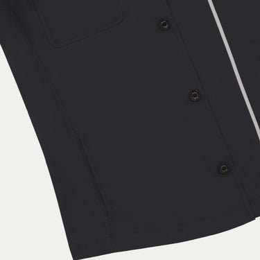 Close-up of Sealup B770BAG 96233 92 navy overshirt's button placket and side pocket, highlighting premium cotton fabric and craftsmanship.