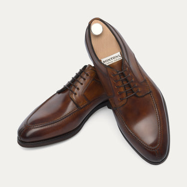 Elegant brown Bontoni Quasimodo Derbies with artisanal stitching and leather finish, displayed with branded insole for premium footwear shoppers.