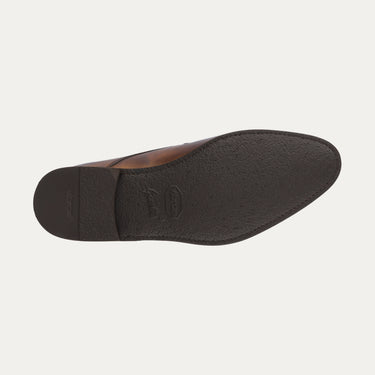 Outsole view of Bontoni Quasimodo Derby in brown, displaying textured sole with logo branding for durable and stylish men's footwear.