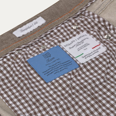 Interior label and lining detail of Richard J. Brown Regular-Fit 5 Pocket Jeans in Brown Melange, featuring Italian craftsmanship and comfort tags.