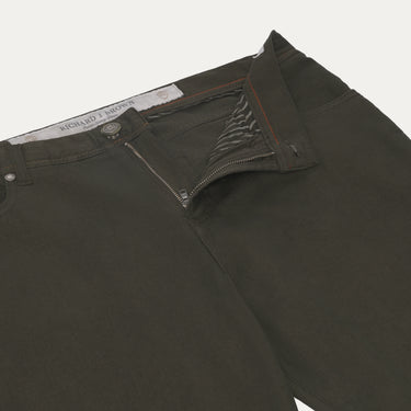 Close-up of front zipper and waistband of Richard J. Brown Regular-Fit 5 Pocket Jeans in Dark Green, highlighting premium stitching.