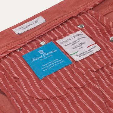 Interior label view of Richard J. Brown red coral jeans with Island Paradise lining and premium branding details.