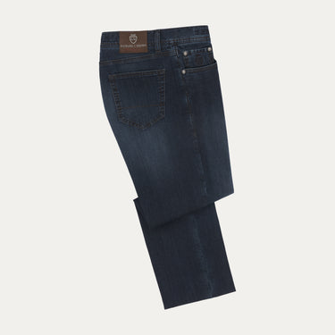 Back view of Richard J. Brown Regular-Fit 5 Pocket Denim Jeans in Dark Blue with branded leather patch. Classic style for men’s casual wear.