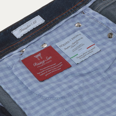 Interior label detail of Richard J. Brown Regular-Fit 5 Pocket Denim Jeans in Dark Blue, featuring Rising Sun lining and brand tags for authenticity.