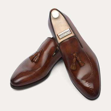 Mocasín con borlas "Magnifico Reverse" en color whisky