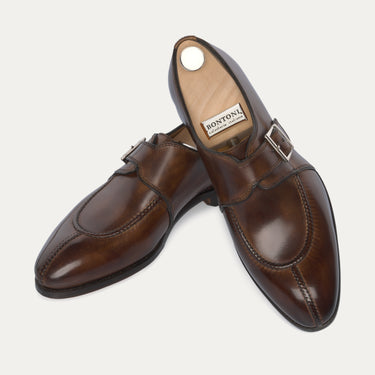 Premium Bontoni 'Magnifico Single-Monk' loafers in chocolate brown, showcasing hand-stitched apron toe and sleek buckle design for SS25 fashion.
