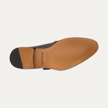 Sole view of Bontoni 'Magnifico Single-Monk' loafer in chocolate brown, showing leather outsole with stamped branding and fine Italian craftsmanship.