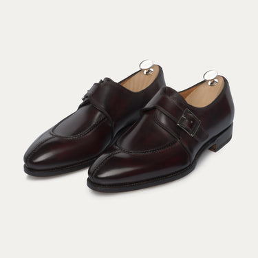 Bontoni 'Magnifico Single-Monk' loafer in burgundy with hand-stitched split-toe apron, elegant leather finish and silver buckle. Ideal for formal wear.