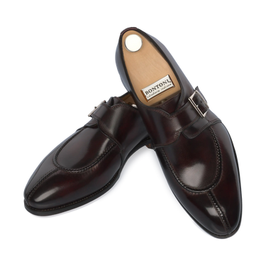 Top and side view of Bontoni 'Magnifico Single-Monk' loafer in burgundy, showcasing premium leather and detailed apron stitching. Luxury men's footwear.