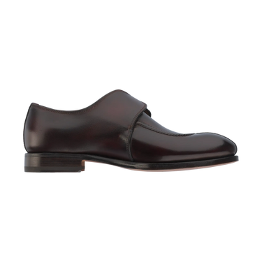 Inner side profile of Bontoni 'Magnifico Single-Monk' loafer in burgundy, featuring sleek leather construction and low stacked heel. Refined Italian design.