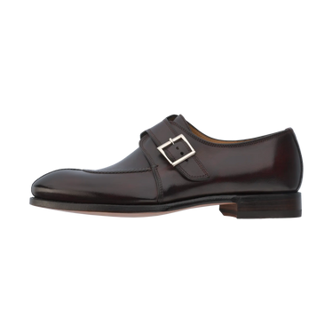 Outer side profile of Bontoni 'Magnifico Single-Monk' loafer in burgundy with silver buckle and apron toe detail. Sophisticated men's dress shoe.