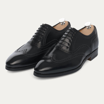 Bontoni Libertino no Fiore black Oxford shoes with medallion toe and perforated detailing, handcrafted for Sartale's FW24/25 collection.