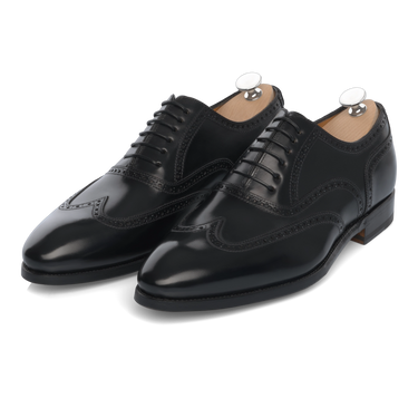 Bontoni Libertino no Fiore black Oxford shoes with medallion toe and perforated detailing, handcrafted for Sartale's FW24/25 collection.