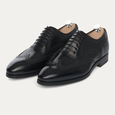 Bontoni Libertino no Fiore black Oxford shoes with medallion toe and perforated detailing, handcrafted for Sartale's FW24/25 collection.