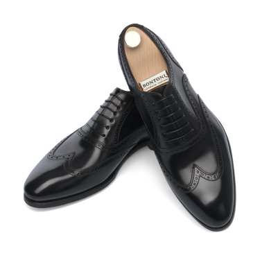 Elegant Bontoni Libertino no Fiore Oxfords in black leather, featuring brogue accents and premium craftsmanship for Sartale's Spring/Summer 25 lineup.