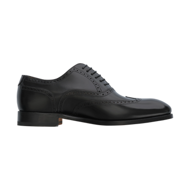 Side profile of Bontoni Libertino no Fiore black Oxford shoe with classic wingtip and perforated design, part of Sartale's MidSeason25 collection.