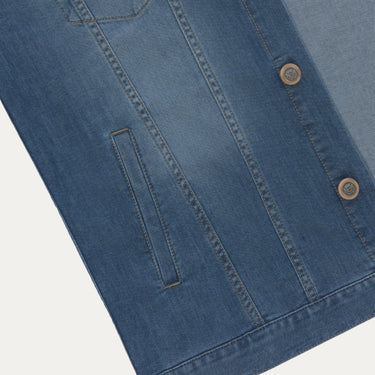 Close-up of Richard J. Brown denim jacket front panel highlighting side pocket detail and premium stitching craftsmanship.