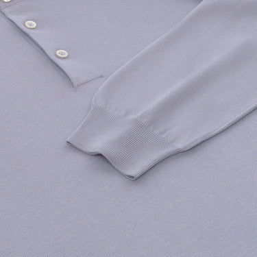 Detail of Cruciani Cloudy Blue Cotton-Silk Polo Shirt sleeve and buttons, emphasizing fine ribbed cuff and elegant fabric finish.