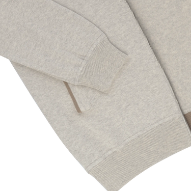Detail of sleeve and pocket on Cruciani Cotton Hooded Zip-Up in Light Grey, emphasizing ribbed cuff and subtle contrast trim.