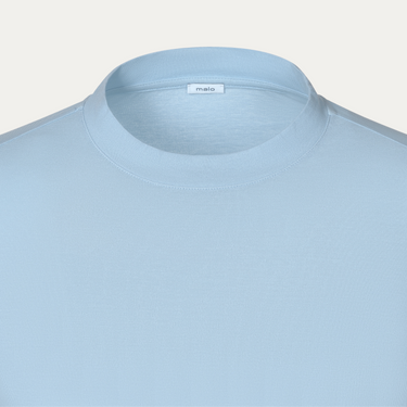 Close-up of Malo Cotton Jersey T-Shirt neckline in Light Blue, highlighting fine stitching and soft cotton jersey texture.