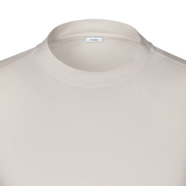Close-up of Malo Cotton Jersey T-Shirt neckline in Light Beige, highlighting fine stitching and soft cotton jersey texture.