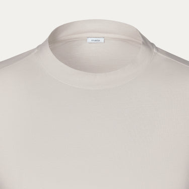 Close-up of Malo Cotton Jersey T-Shirt neckline in Light Beige, highlighting fine stitching and soft cotton jersey texture.
