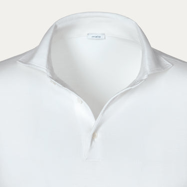 Close-up of Malo Cotton Jersey Polo Shirt in White highlighting the soft collar, button placket, and fine jersey texture for SS25.
