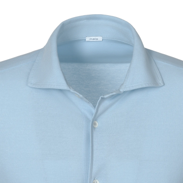 Close-up of Malo Jersey Cotton Shirt collar in Light Blue, highlighting soft jersey texture and minimalist design for modern menswear.