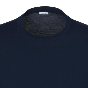 Close-up of Malo pullover neckline with visible brand label, highlighting the premium wool fabric in royal blue from SARTALE.