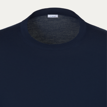 Close-up of Malo pullover neckline with visible brand label, highlighting the premium wool fabric in royal blue from SARTALE.