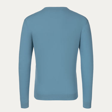 Back view of Malo light blue cotton pullover, showcasing minimalist design and fine knit texture from SARTALE's SS25 collection.