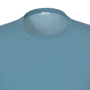 Close-up of Malo pullover neckline with visible brand label, highlighting premium cotton knit and refined craftsmanship.