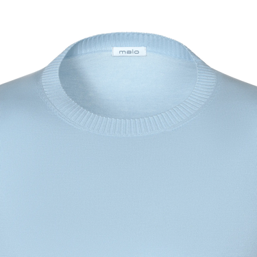 Close-up of Malo Cotton Crew-Neck T-Shirt neckline in Light Blue, highlighting ribbed collar and soft cotton fabric for refined summer comfort.