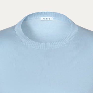 Close-up of Malo Cotton Crew-Neck T-Shirt neckline in Light Blue, highlighting ribbed collar and soft cotton fabric for refined summer comfort.