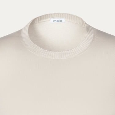 Close-up of Malo Cotton Crew-Neck T-Shirt in Beige, highlighting ribbed neckline and soft cotton texture for refined seasonal style in SS25.
