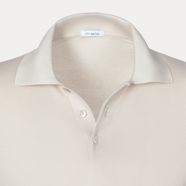 Close-up of Malo Cotton Polo Shirt in Beige highlighting the soft collar, button placket, and fine knit fabric for a luxurious finish.