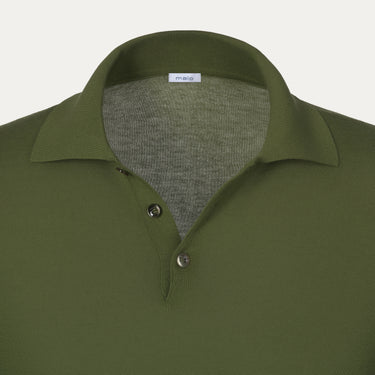 Close-up of Malo green polo shirt collar and button placket, highlighting fine stitching and luxury cotton texture.