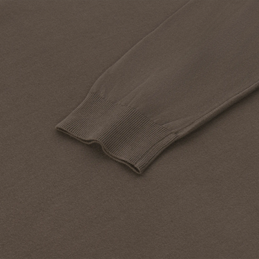 Detailed view of ribbed cuff on Malo brown cotton long sleeve polo shirt, emphasizing craftsmanship and soft knit fabric.