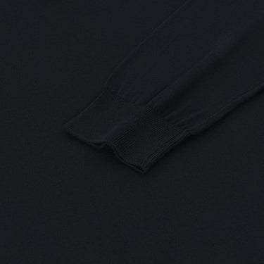 Detailed view of the ribbed cuff on Malo dark blue cotton long sleeve polo shirt, emphasizing quality and comfort.